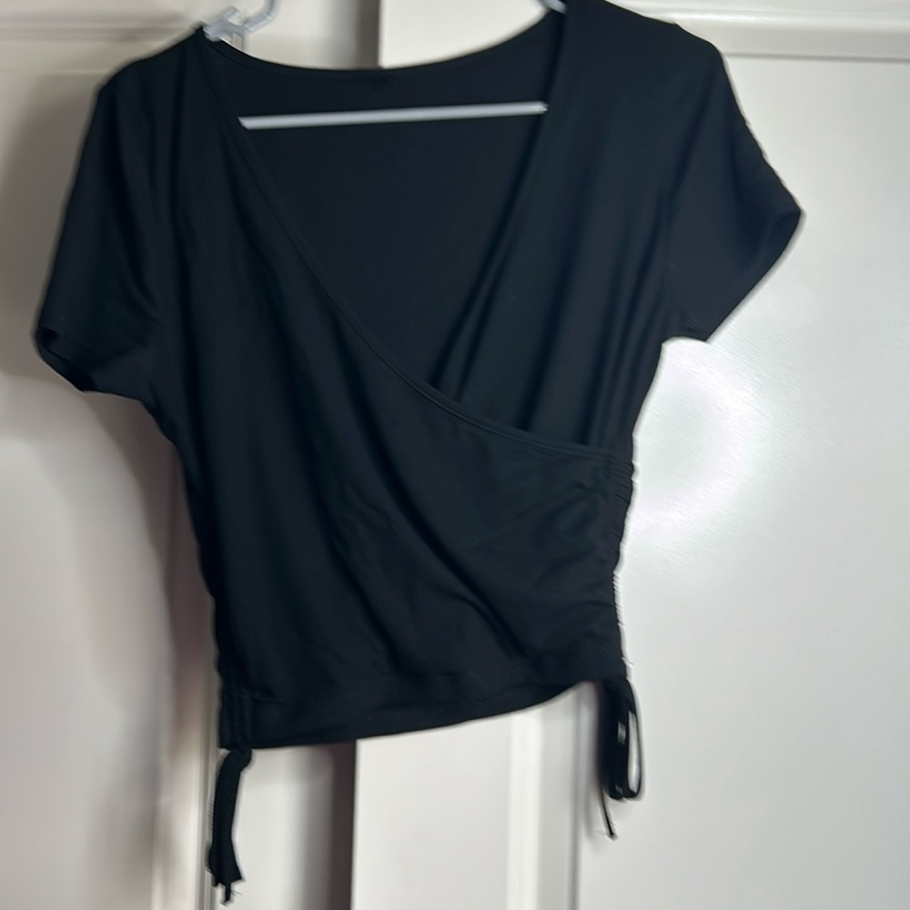Black crossover tee with ruffles